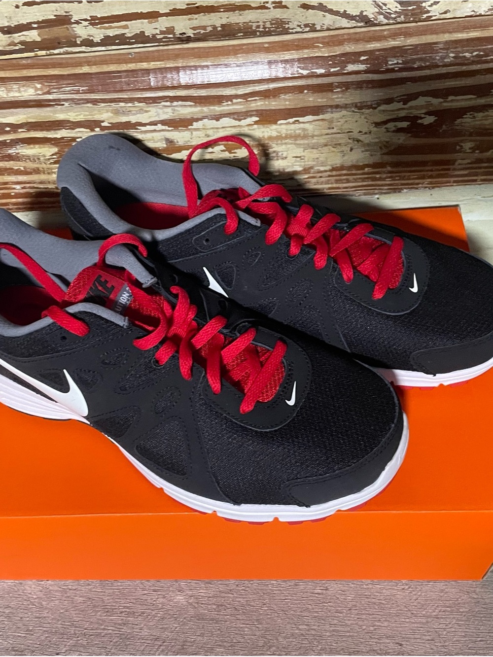Nike Black Sneakers with Red Laces and White Swoosh